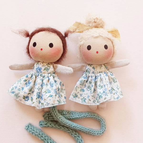 Teeny dolls in blue ditsy floral